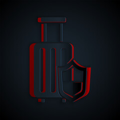 Paper cut Travel suitcase with shield icon isolated on black background. Traveling baggage insurance. Security, safety, protection, protect concept. Paper art style. Vector.