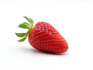 close up of a ripe strawberry on a white background