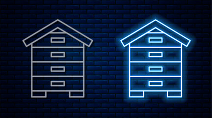 Glowing neon line Hive for bees icon isolated on brick wall background. Beehive symbol. Apiary and beekeeping. Sweet natural food. Vector