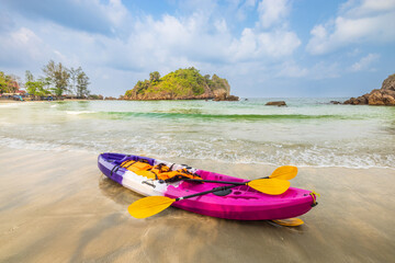 The colourful of kayak on the beach.