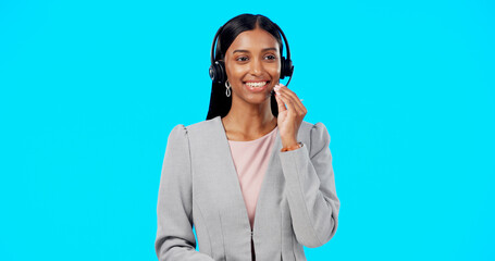 Call center, crm or Indian woman in studio for communication isolated on blue background. Customer...