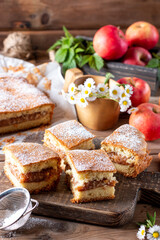 Clasic sponge cake, selective focus. Homemade pie on wooden background