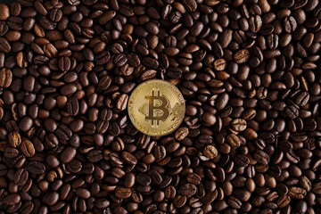 bitcoin on coffee beans for background