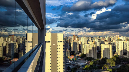 Fototapeta na wymiar Beautiful view of a dramatic dark stormy sky. The rain is coming soon. The pattern of the clouds over the city. Very heavy rain sky in Sao Paulo city, Brazil South America.