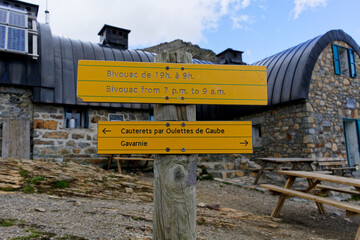 Hiking panel at the Bayssellance refuge in the French Pyrenees.