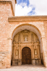 Fototapeta na wymiar Entrance door of the main church in the small town of El Toboso (Spain)