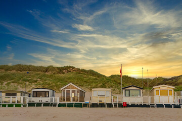 Beach houses on the beach of Egmond aan Zee/NL in the evening