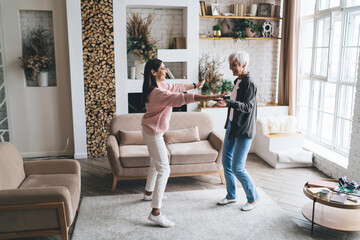 Obraz premium Diverse women dancing in living room