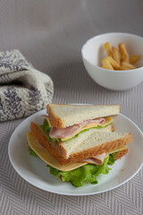 Breakfast sandwich with French fries