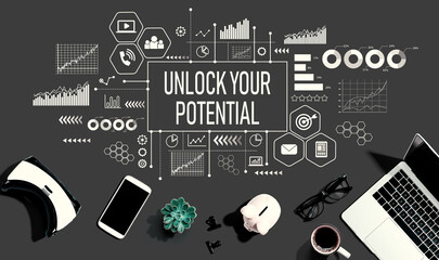 Unlock your potential theme with electronic gadgets and office supplies - flat lay