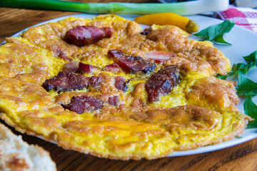 Egg omelette with bacon, traditional morning breakfast...