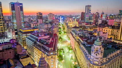 Fototapeta na wymiar Aerial Drone Panoramic Above Buenos Aires City Center at Night, Plaza de Mayo and Microcentro, Business District