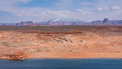 Wahweap Bay with mountains in the background.