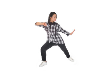 Fototapeta na wymiar Asian young woman doing martial arts in everyday casual street clothing