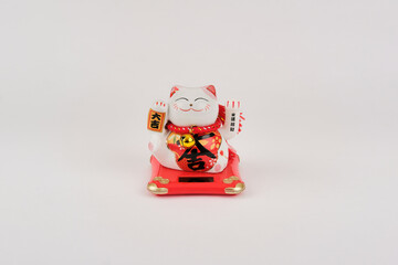 One white and red chinese good fortune luck cat
