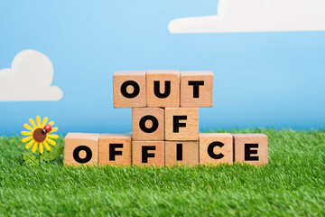 out of office in wooden blocks