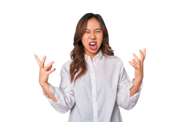 A young chinese woman screaming with rage.