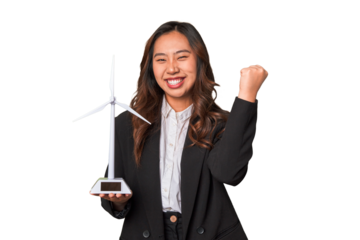 A young Chinese businesswoman proudly holds a windmill, symbolizing her commitment to renewable energy and sustainable development.