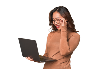 A young asian woman working with her laptop