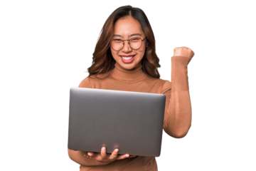 A young asian woman working with her laptop
