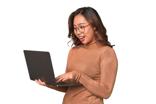 A young asian woman working with her laptop