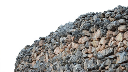 An old stone wall or piled rocks isolated on empty background