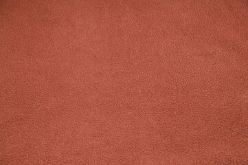 red unusual texture. fleece brown surface . fabric factory concept