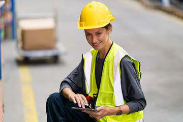 Warehouse workers checking the inventory. Products on inventory shelves storage. .Worker Doing Inventory in Warehouse. Dispatcher in uniform making inventory in storehouse.