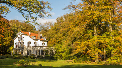 Dutch historic country house in autumn colors in Ede, Gelderland, Netherlands - Powered by Adobe