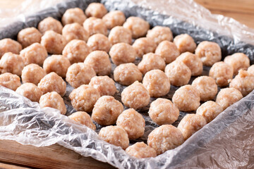 Frozen meatballs. Raw ingredients for cooking food