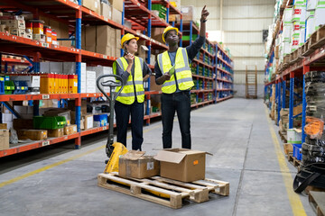 Warehouse workers checking the inventory. Products on inventory shelves storage. .Worker Doing Inventory in Warehouse. Dispatcher in uniform making inventory in storehouse. supply chain concept