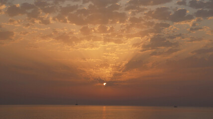 Orange sunrise on the beach