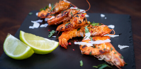 Delicious gourmet king prawns with lime