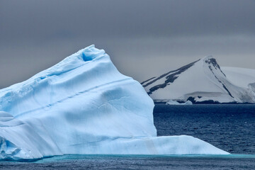 Pinnacle Iceberg floating in Charlotte Bay on the Antarctic Peninsula