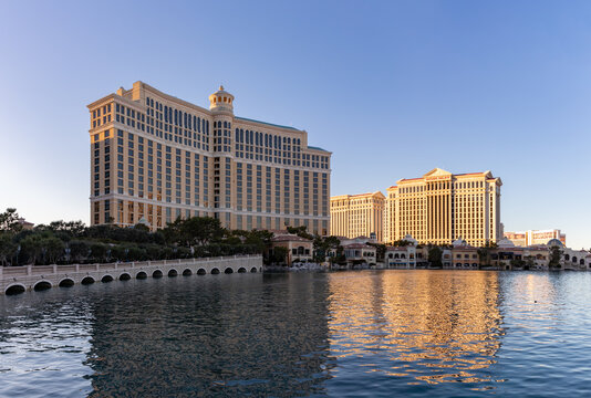 Las Vegas, United States - November 23, 2022: A picture of the Bellagio Hotel and Casino and the Caesars Palace being reflected on the Bellagio Fountain.