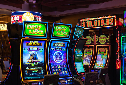 Las Vegas, United States - November 23, 2022: A picture of colorful digital slot machines inside a casino.