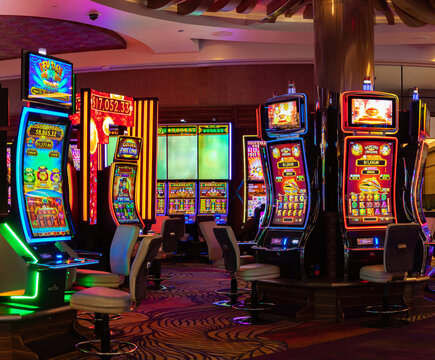 Las Vegas, United States - November 23, 2022: A picture of colorful digital slot machines inside a casino.