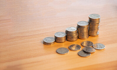 coins stacked in layers From small money growth concept to big business profits.