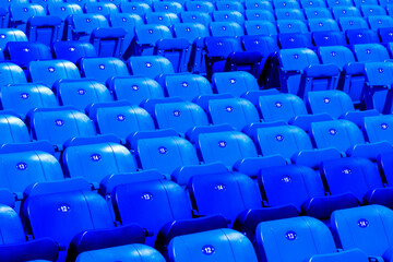 Colorful seats in a stadium.