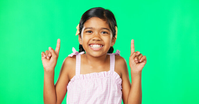 Face, pointing and black girl with motivation, green screen and inspiration with joy, happiness and space. Portrait, African American female child or young person with gesture for direction or choice - Powered by Adobe