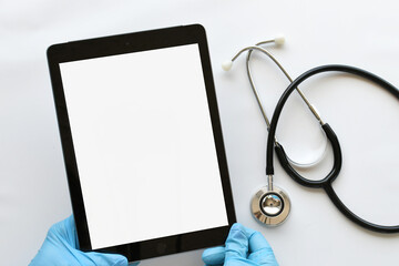 Medical professional tablet blank white screen for mock up of test results or records, doctor