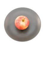 immagine con mela rossa da agricoltura biologica su piatto grigio scuro e sfondo trasparente