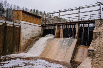 A small hydroelectric power station is located on the river in spring