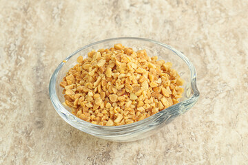 Crunched roasted peanut in the bowl