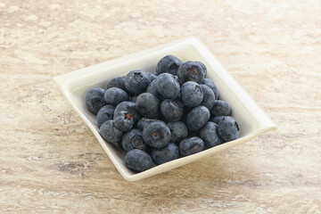 Sweet ripe blueberry heap in the bowl