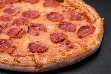 Delicious fresh pepperoni pizza with sesame seeds on the sides
