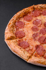 Delicious fresh pepperoni pizza with sesame seeds on the sides