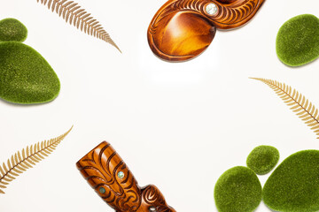 New Zealand, country symbols, traditional Maori carvings, silver fern leaves, white background,...