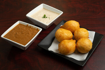 Deep fried Indian flour and yogurt dumplings