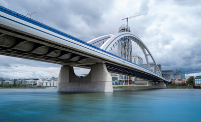 Obraz premium Old Bridge, or Starý most over the Danube, dedicated pedestrian and cycle paths with views of Old Town skyline in Bratislava, Slovakia